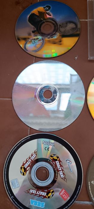 11 CDs / DVD jogos usados