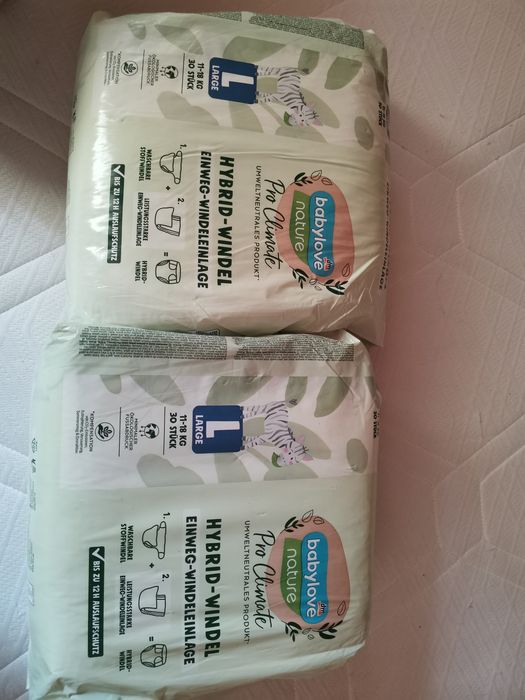 Продам памперси babylove hybrid 2 упаковки по 30 шт