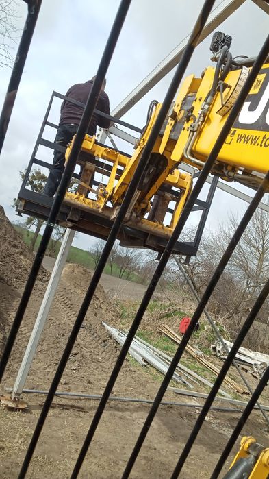 Usługa  ładowarką teleskopową koparką minikoparką wiertnica wynajem