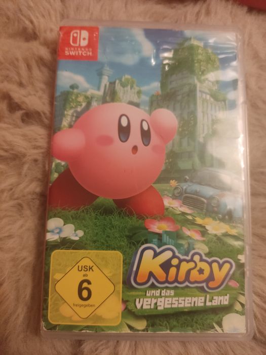 Jogo  Kirby e a Terra Perdida para Nintendo Switch.

- Plataforma: Nintendo Switch
- Género: Plataforma