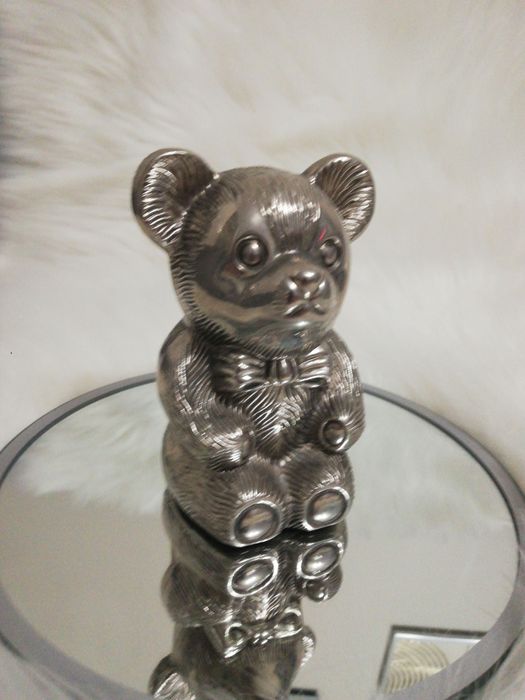 Srebrny miś skarbonka.