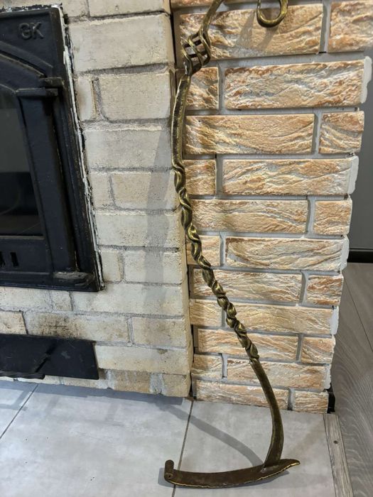 Кована кочерга для каміну