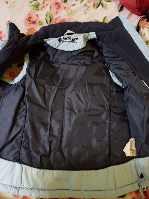 Продам женскую жилетку