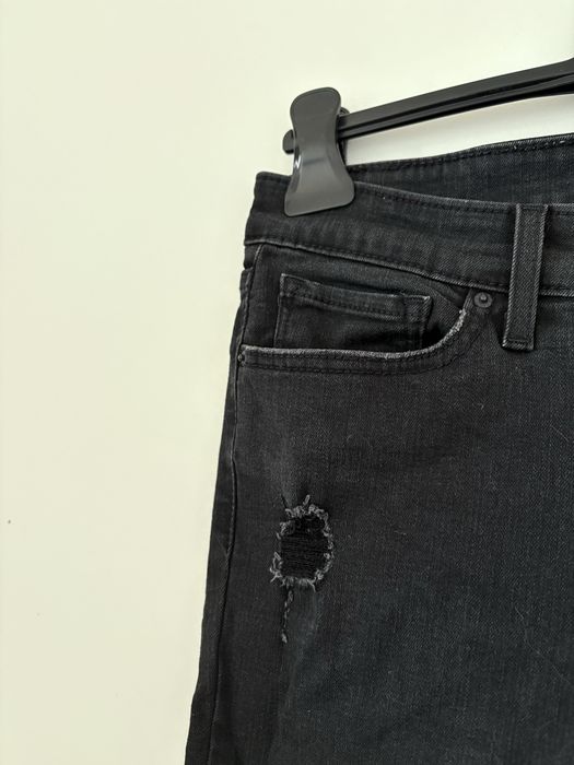 jeansy skinny levis z przetarciami M