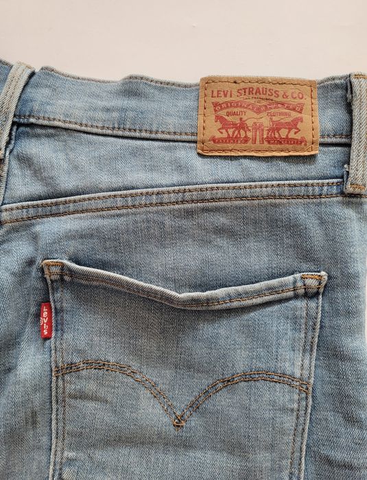 Jasne jeansy spodnie bootcut levis średni stan dzwony M 38