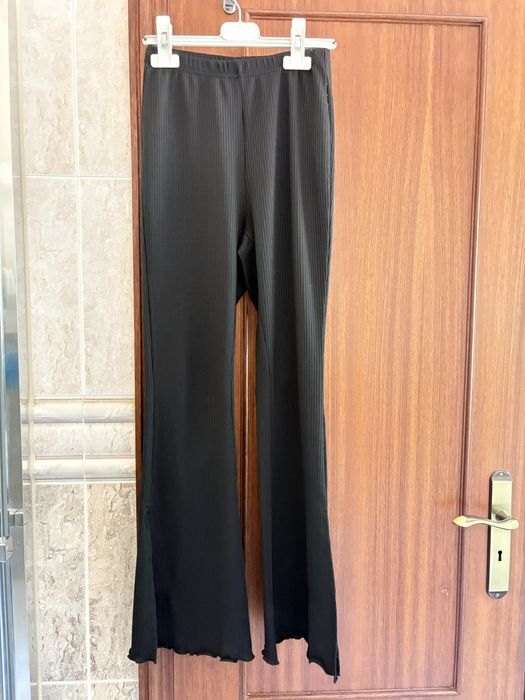 Calças boca de sino pretas