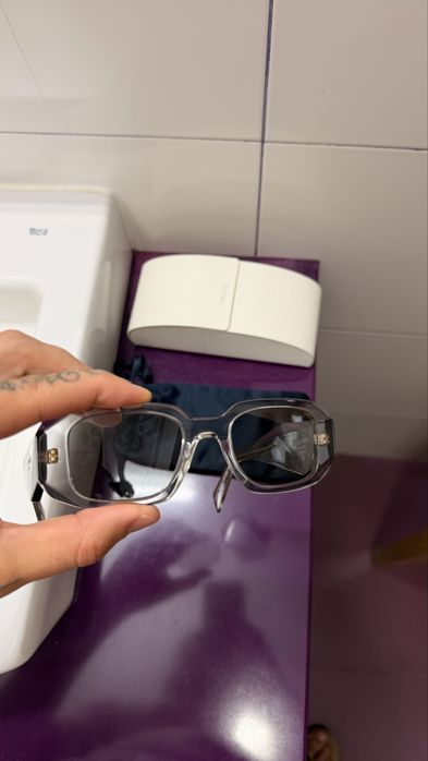 2 pares de oculos da prada