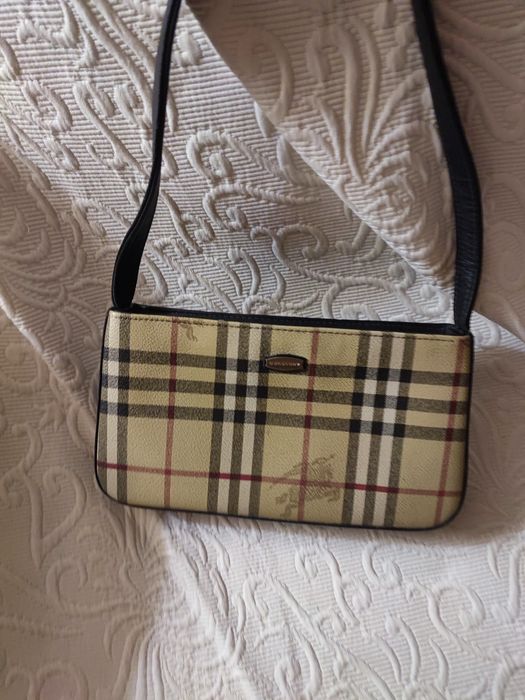 Vendo mala pequena de senhora