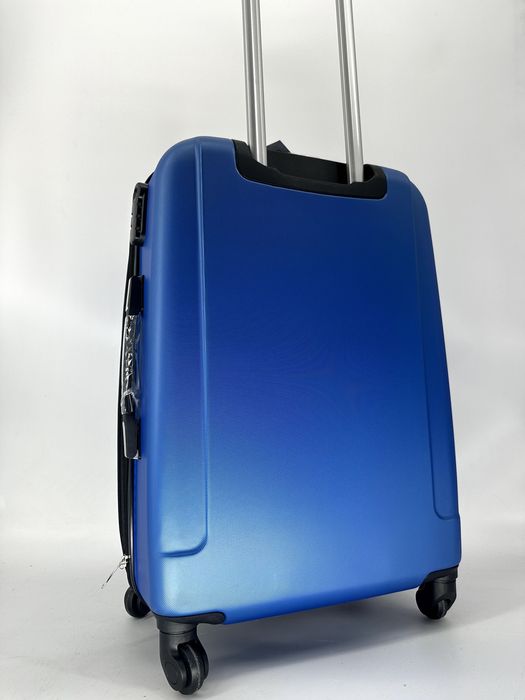 Nowa walizka średnia chabrowa, niebieska