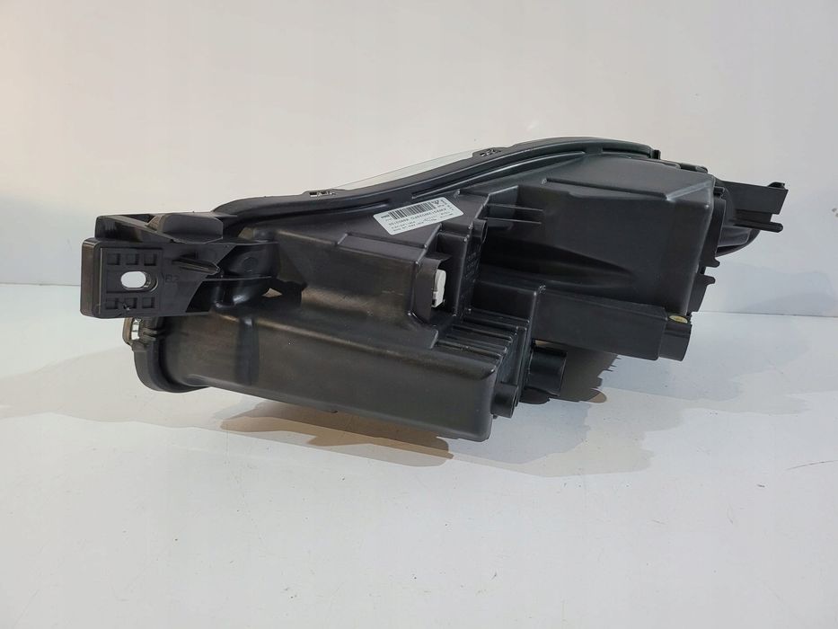 Jaguar XJ lampa przednia bi-xenon R 13440