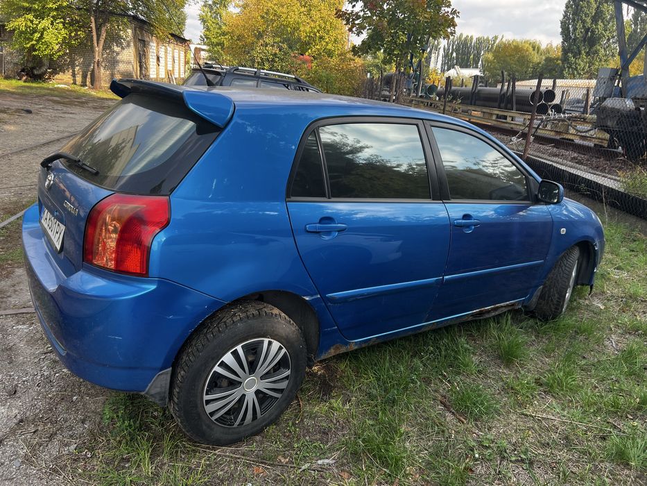 Toyota Corolla 2006 (E120) Рестайлінг • 1.6 Бензин • Надійний хетчбек