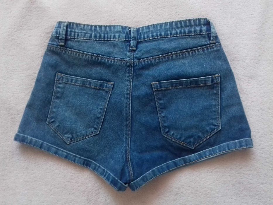 Jasne jeansowe spodenki Sinsay