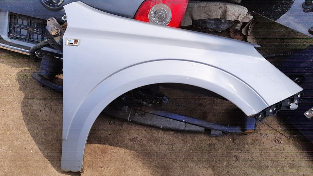 Lak. Z157 błotnik prawy przedni Opel Astra H III