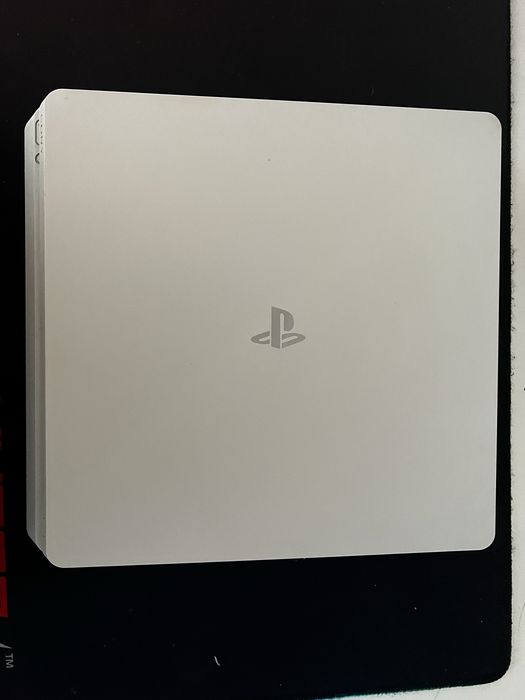 Playstation 4 branca com comando e caixa
