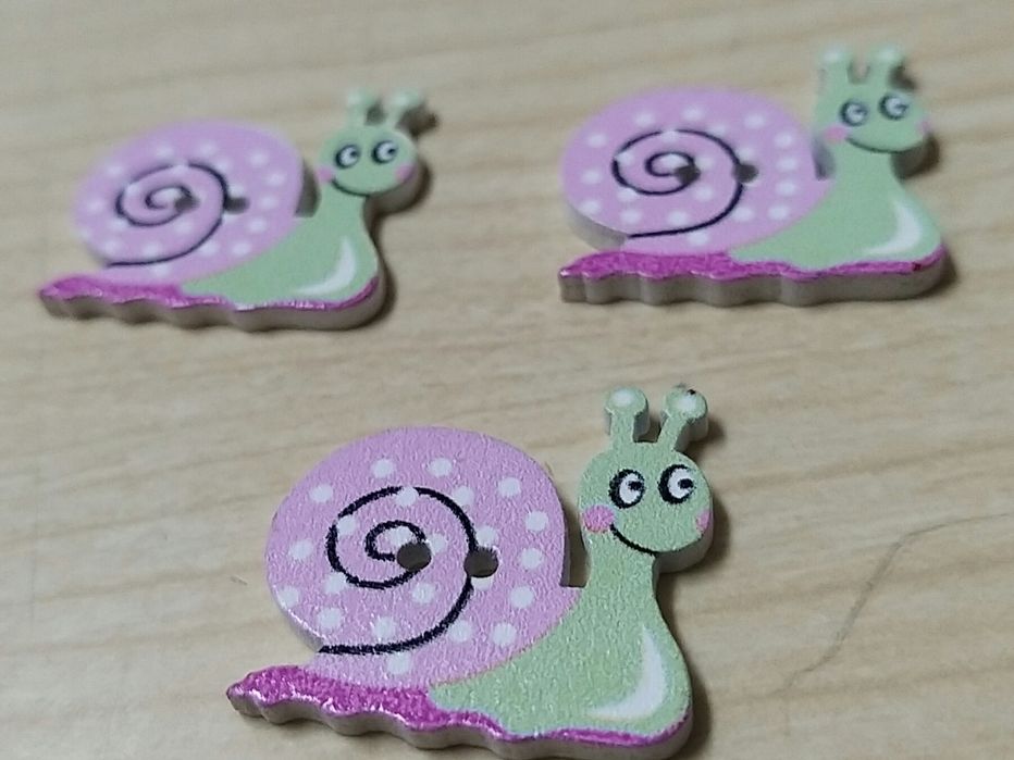 Botões em forma de Caracol.