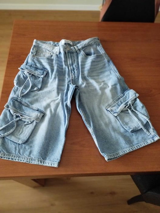 Calções de ganga de mulher