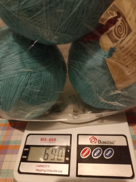 Пряжа півшерсть у бобінах