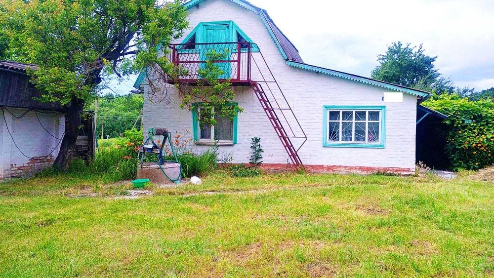 Продам будинок с.Коряківка.Озеро,ліс,літня кухня,лазня,гараж,альтанка