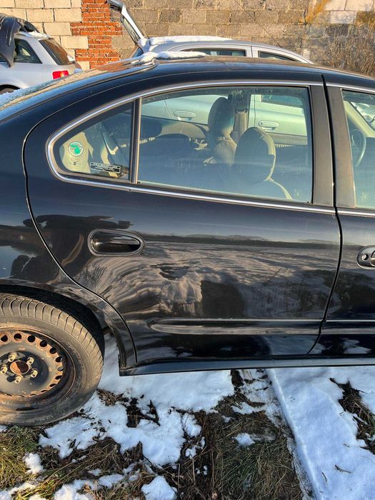 Drzwi tył tylnie lewe prawe Chevrolet Alero Oldsmobile