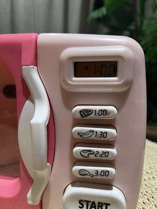 Microondas cor de rosa de brincar