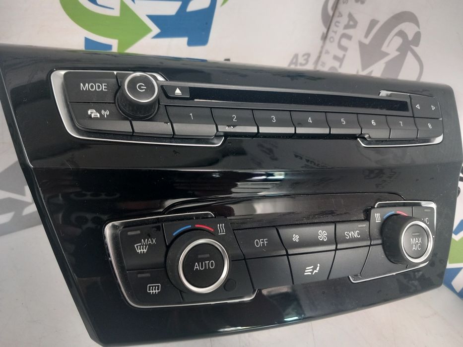 Consola central radio control ar condicionado  BMW X1