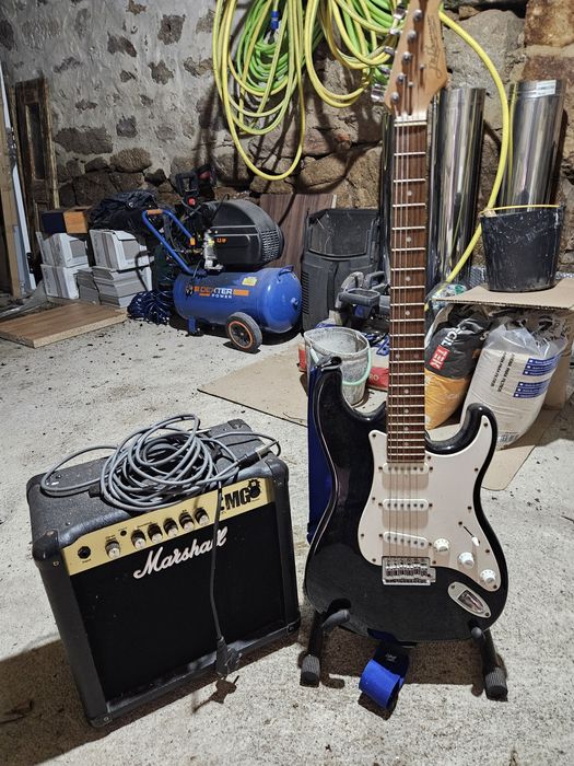 Guitarra com amplificador