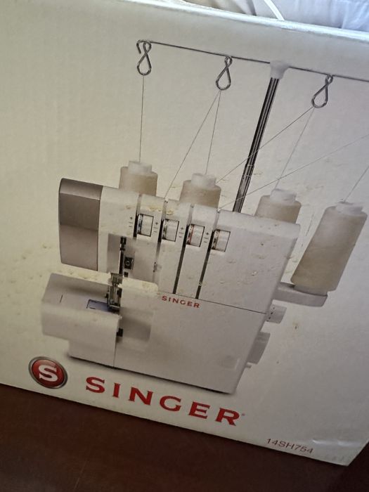 Maquina corte e cose Singer