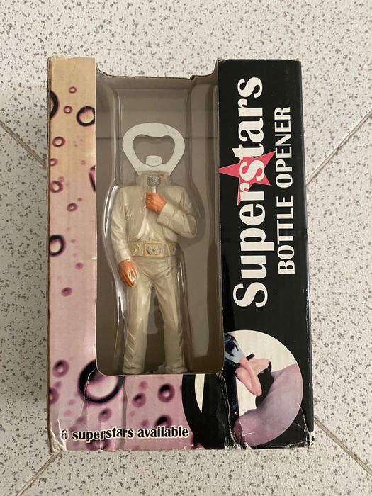 Abre cápsulas tema do Elvis  novo