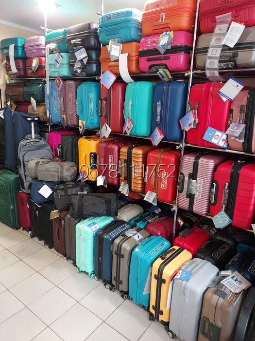 МАГАЗИН - СКЛАД валізи чемоданы сумки на колесах ручна поклажа рюкзаки