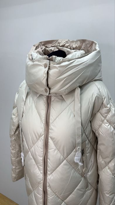 Жіночий пуховик ,є різні розміри CLASNA