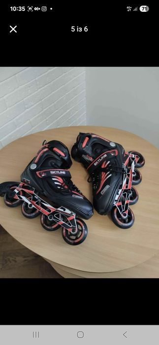 Продам ролики ,наколінники, шолом