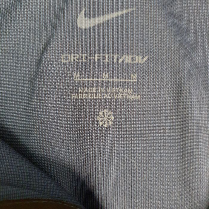 Nike Tour чоловічі Dri-FIT ADV 1/2-Zip для гольфу Top FD5833-410