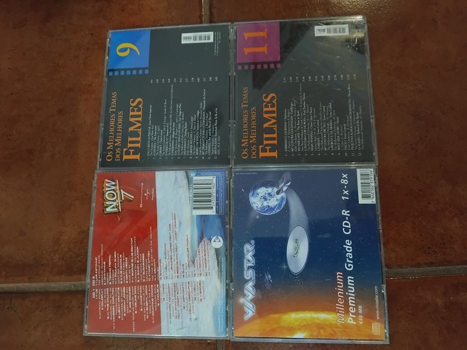 4 caixas de cds vazias (Now 7, No1, Os melhores temas dos filmes)
