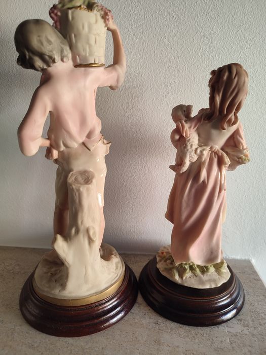 Casal de estatuetas de marfinite