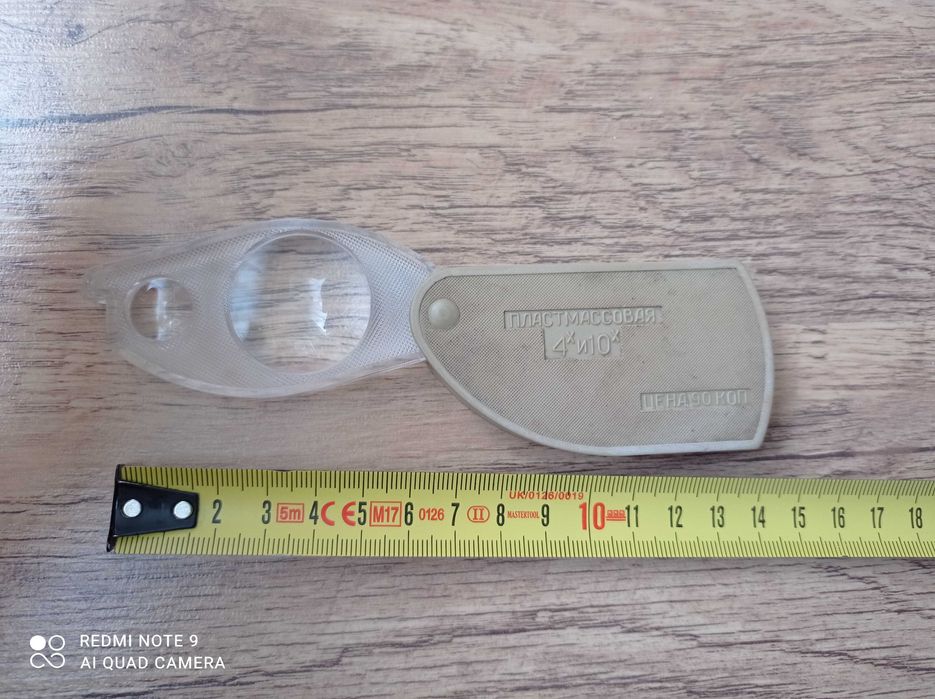 Увеличительное стекло оптика лупа.