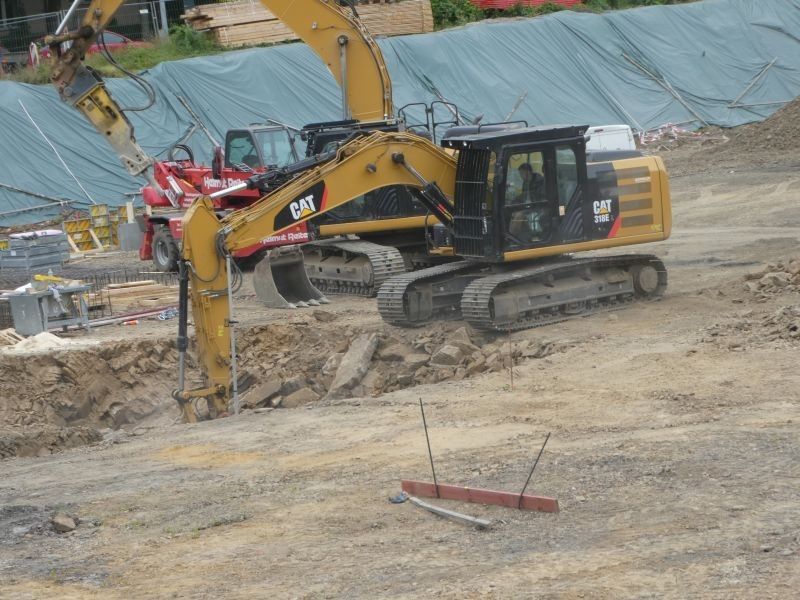 Послуги екскаватора Caterpillar 318 EL