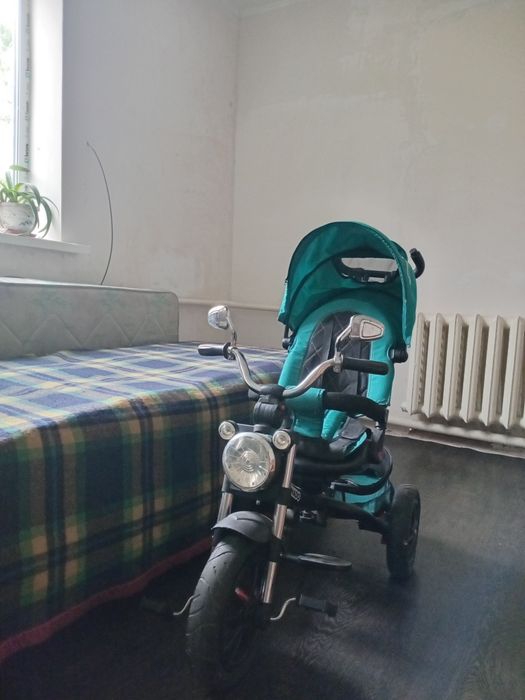 Продам отличный детский трехколесный велосипед-коляску Baby Tilly Tornado в красивом бирюзовом цвете.