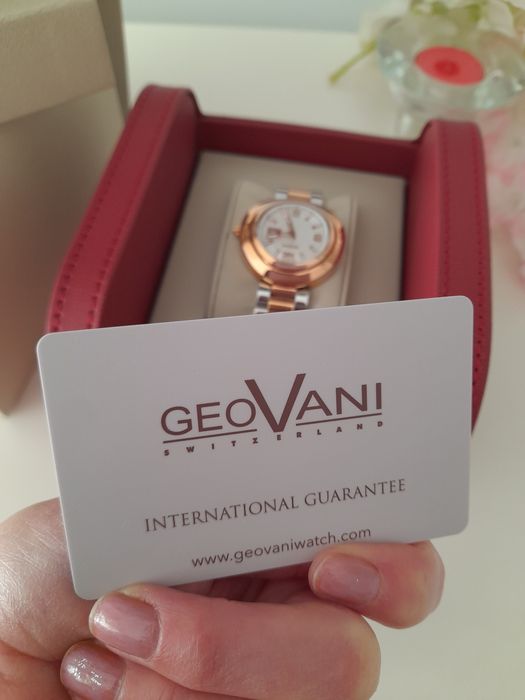 Relógio dourado e prateado "GeoVani"