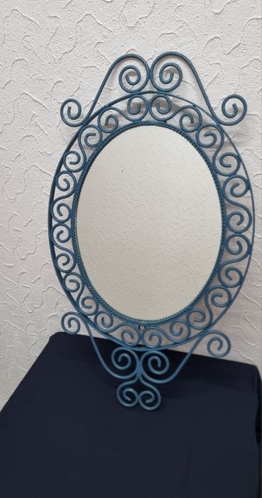 Espelho com moldura em Ferro Forjado.