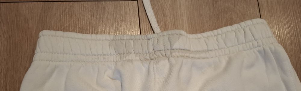 Kremowe spodnie dresowe Nike XS