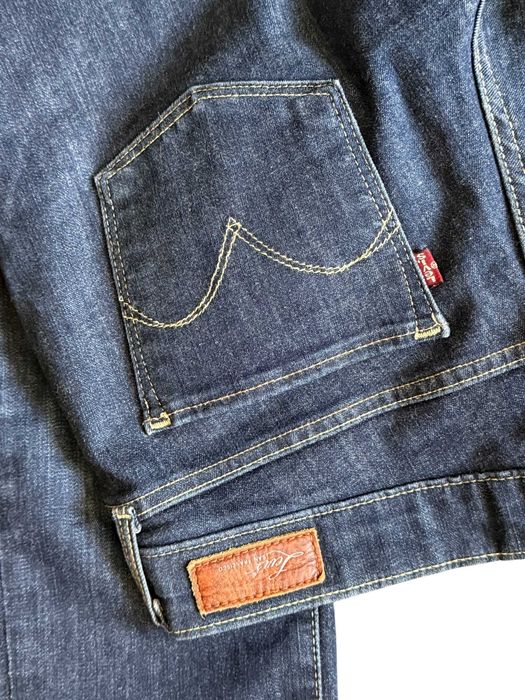 Stylowe damskie dżinsy  Levi's kultowy model Slight Curve W29 L32