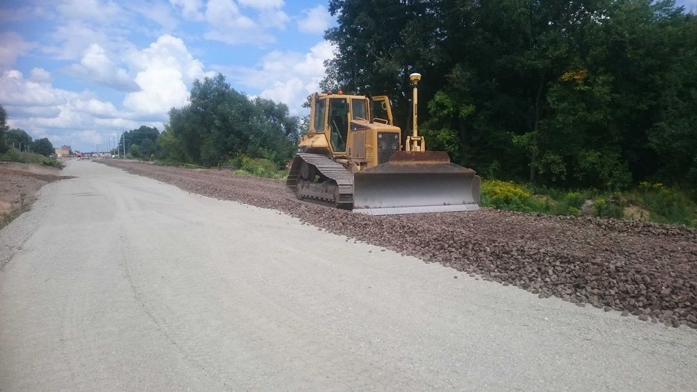 Usługi Spycharką, Koparką Roboty ziemne, Niwelacja terenu, CAT
