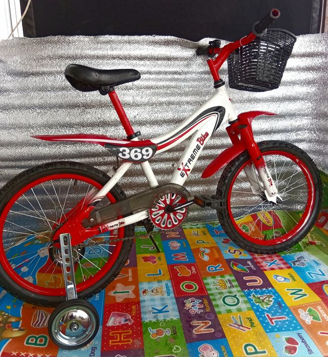 Продам детский велосипед Extreme Bike на 18 дюймов+колесики.