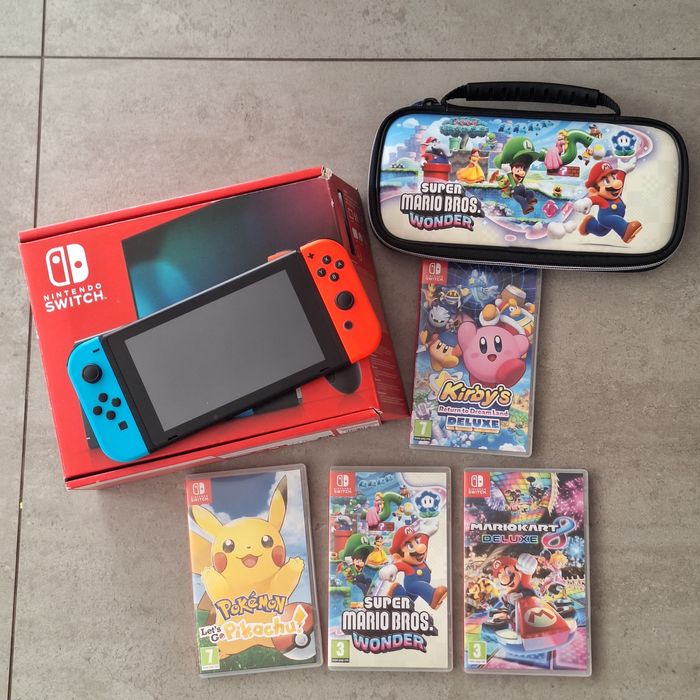 Nintendo Switch + gry +etui jak nowe.