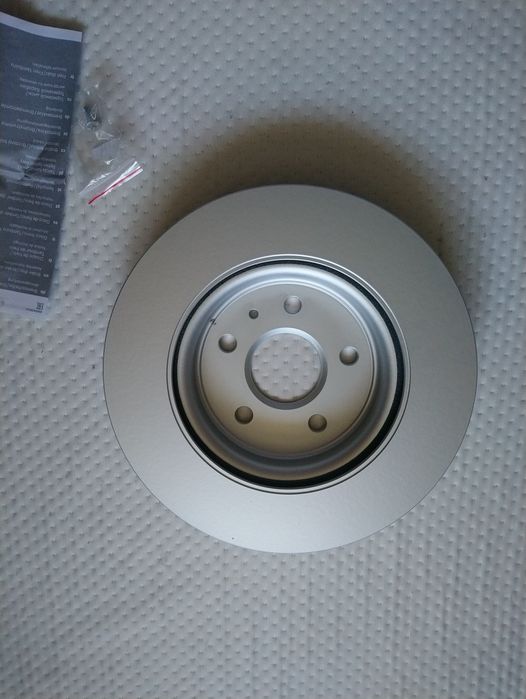 Гальмівний (тормозний) диск Bosch 0986479C71 E1-90R-02C0074/1566  новий в упаковці