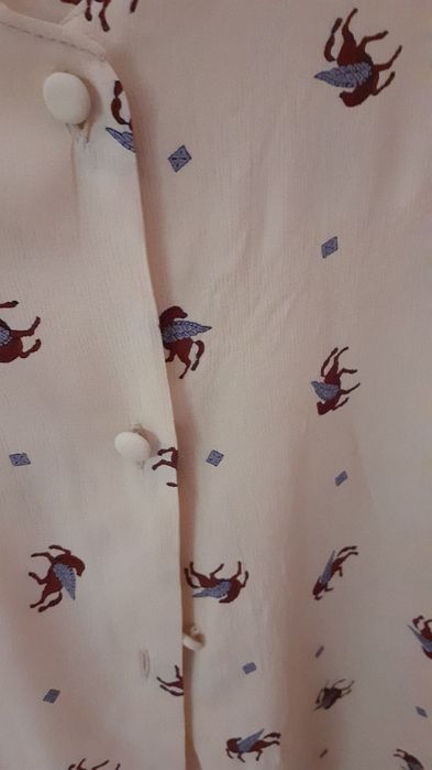 2 € Blusa XL de manga curta, botões forrados, tecido fresco