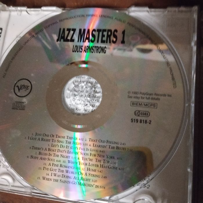 4 płyty CD  Louis Armstrong,Miles Davis,
