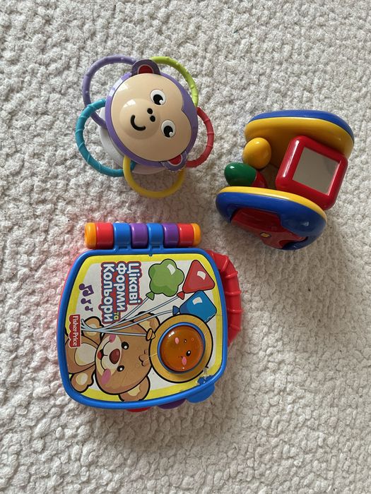 Музична книжечка Fisher-Price українською, погремушки
