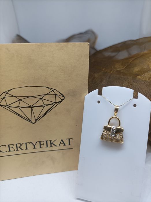 Złoty wisiorek torebka z diamentami złoto 750