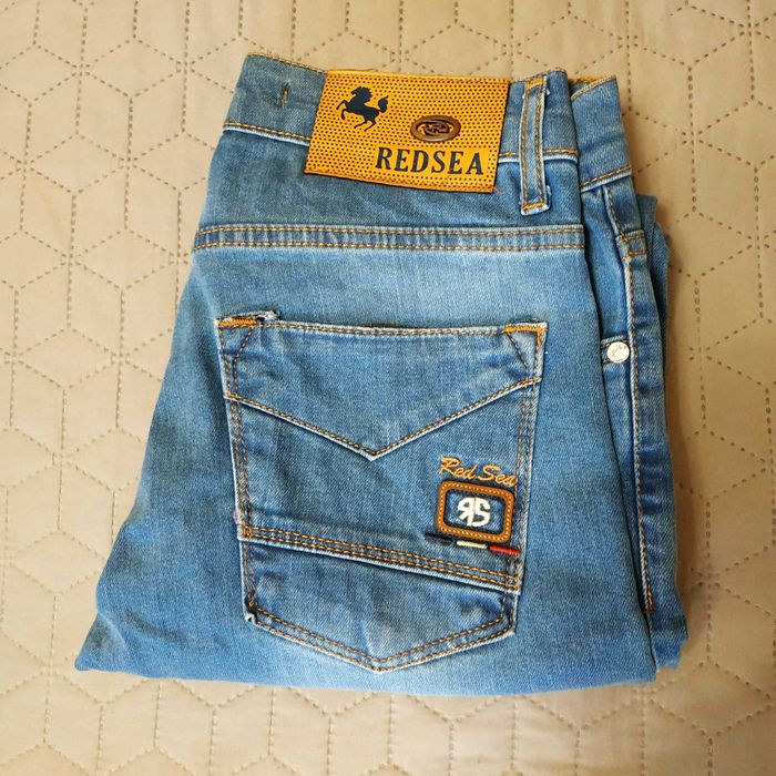 Нові чоловічі джинси